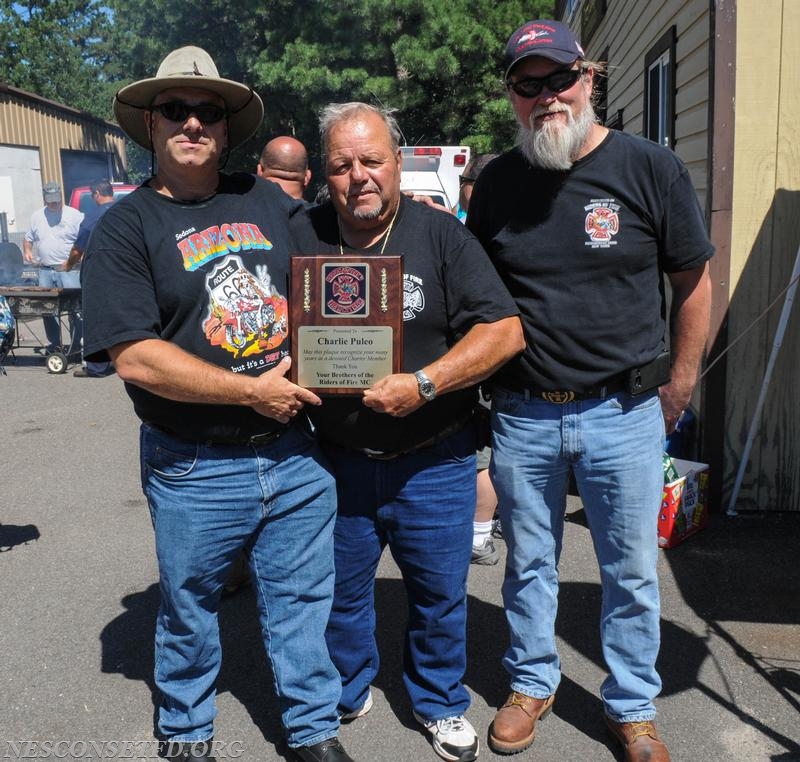 Riders of Fire Motorcycle Club, President Vincent Ammirati along with Vice President Chris Mckay where honored to present Charlie Puleo with a plaque recognizing his many years as a devoted charter member of the club. Charlie is also an Ex Chief and past Commissioner and is still active member with the Nesconset Fire Department Fire Police.   

